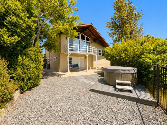 Building Photo - Stunning 3-Level Home with Canyon Views, Private Spa & Multiple Outdoor Living Spaces!