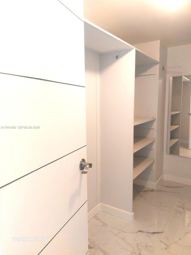 Building Photo - 5005 Collins Ave