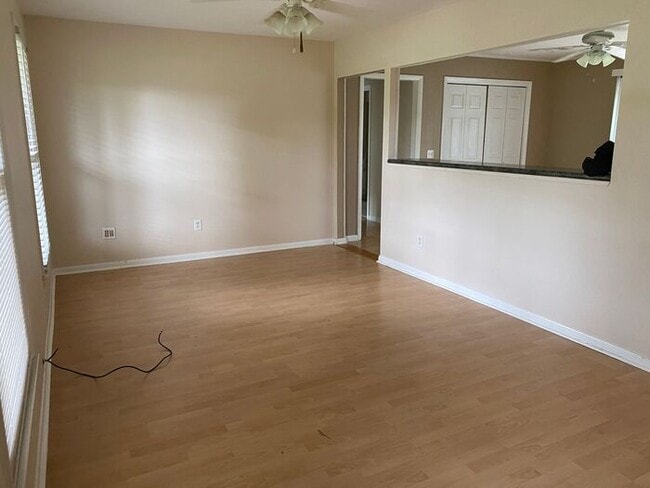 Building Photo - COMING SOON! 4Br, 2.5 baths, large kitchen, large bedrooms, fence, storage and more! N. College R...