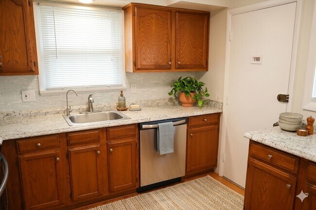 Building Photo - Renovated 3BR 2BA Rockville Split-Level with Huge Fenced Yard Available July