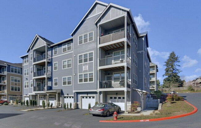 Building Photo - Modern Ground-Level Condo in River Terrace...