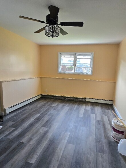 Building Photo - 69-23 De Costa Ave