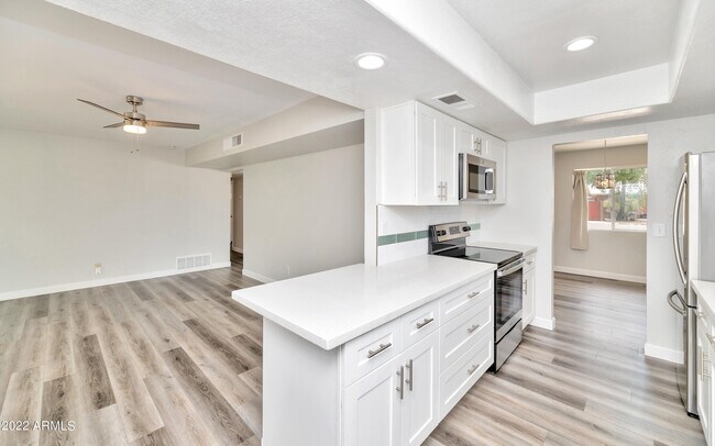 Building Photo - 8444 E Plaza Ave