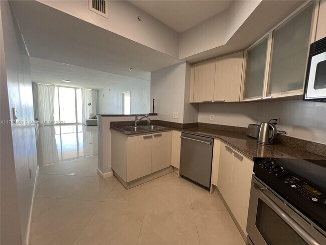 Building Photo - 16699 Collins Ave