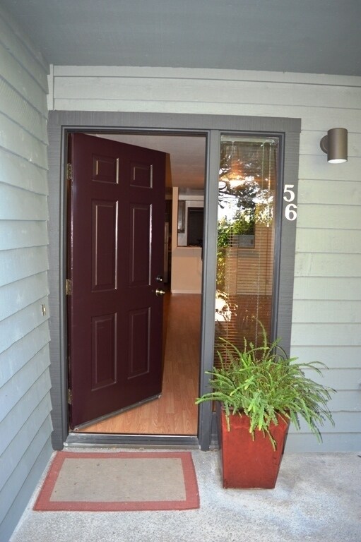 Building Photo - Spacious and Conveniently Located with Private Patio and Parking