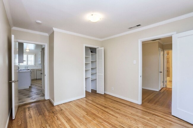 Building Photo - 3 Bed / 2 Bath Redwood City home with calming backyard oasis and a white picket fence. YouTube to...