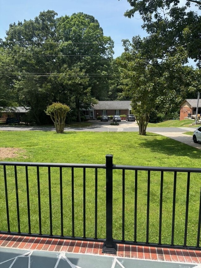 Building Photo - Nice brick home, single carport, storage b...