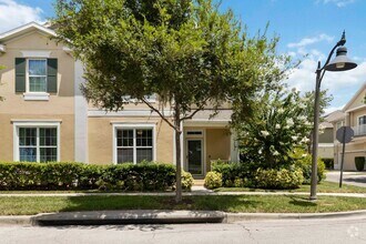 Building Photo - Beautiful 4/2.5 Townhome for Rent in Harmo...