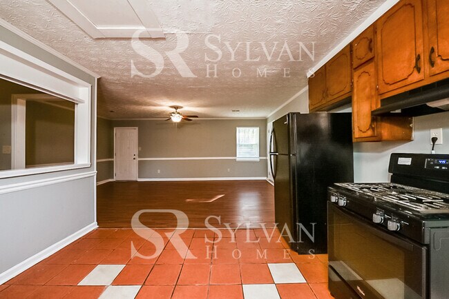 Building Photo - The living is easy in this 3 bedroom, 2 bathroom home