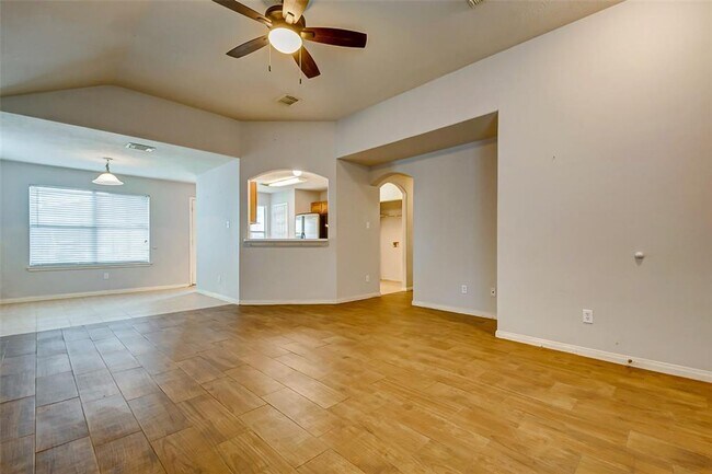 Building Photo - This one-story, three-bedroom, two bath ho...