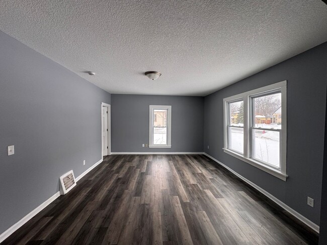 Building Photo - AVAILABLE NOW! Large 3 Bedroom, 2 Bathroom, with Extra Rooms and Two Car Garage in Anoka