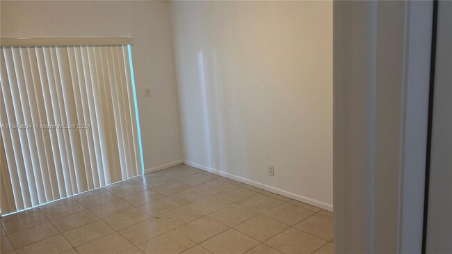 Building Photo - 3100 Coral Springs Dr