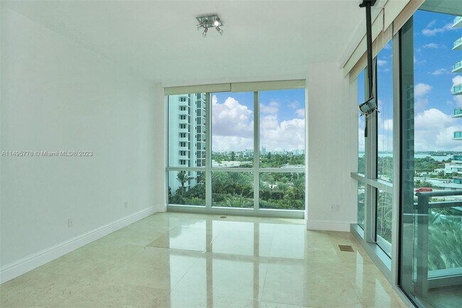 Building Photo - 10295 Collins Ave