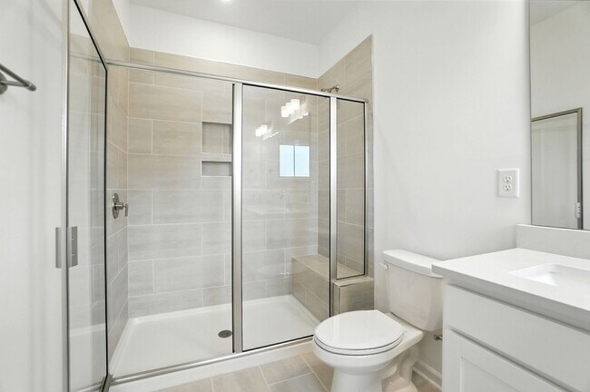 Building Photo - Brand-new three-story townhome in the Univ...