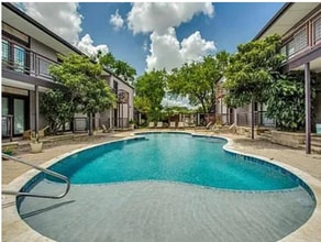 Building Photo - *** Coming Soon *** Elegant 2BR/2B with Yard, Pool & Covered Parking