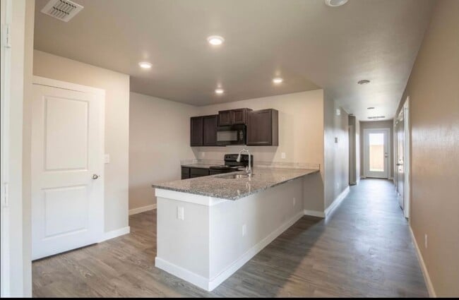 Building Photo - Exclusive Bell Farms Townhomes