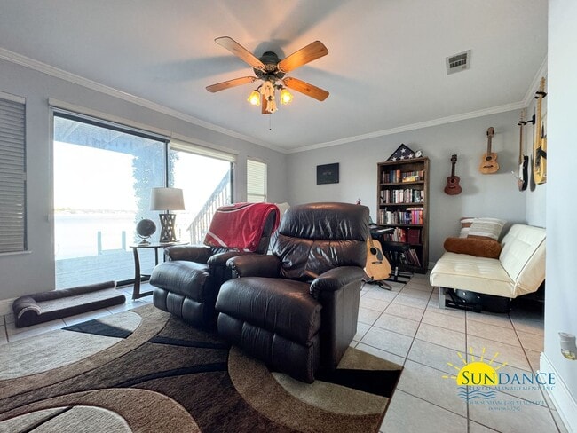 Building Photo - Waterfront Luxury Living on Garniers Bayou with Boat Slip/Lift Included!