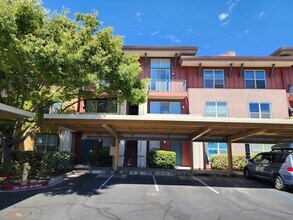 Building Photo - Modern 2BR/2.5BA Condo with Ensuite Bathro...