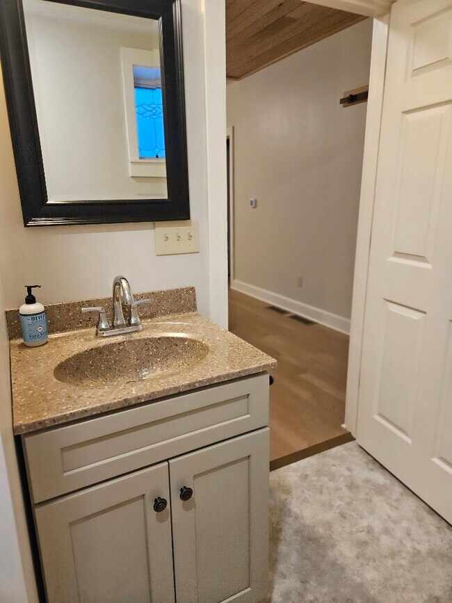 vanity w/granite top - 223 E 10th St