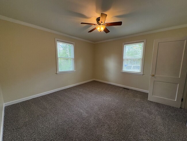 Building Photo - Beautiful refurbished home with hardwood floors throughout!