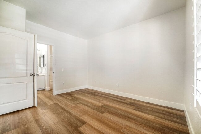 Building Photo - Coastal Living at Its Best – Upgraded 1BR Condo with Private Patio & Resort-Style Amenities