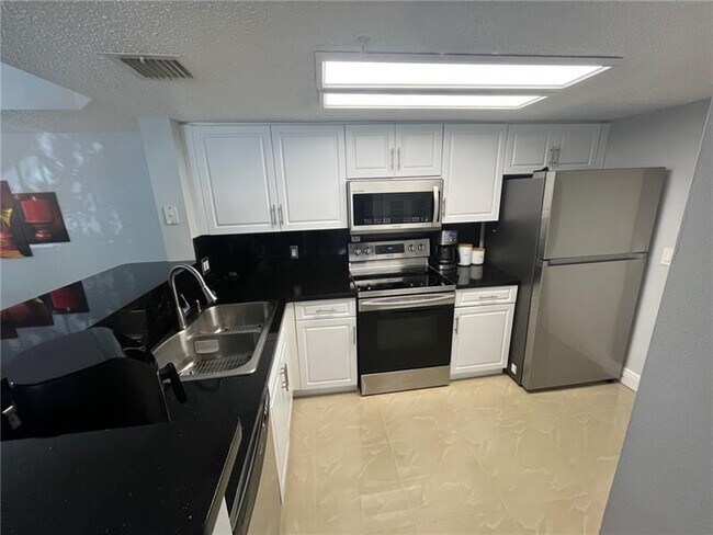 Building Photo - 5051 Wiles Rd