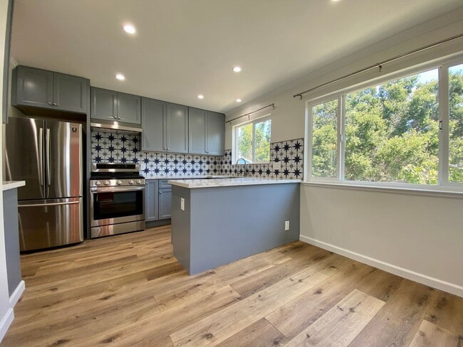 Building Photo - Remodeled 3BR, 2BA with Orchard, Garage & ...