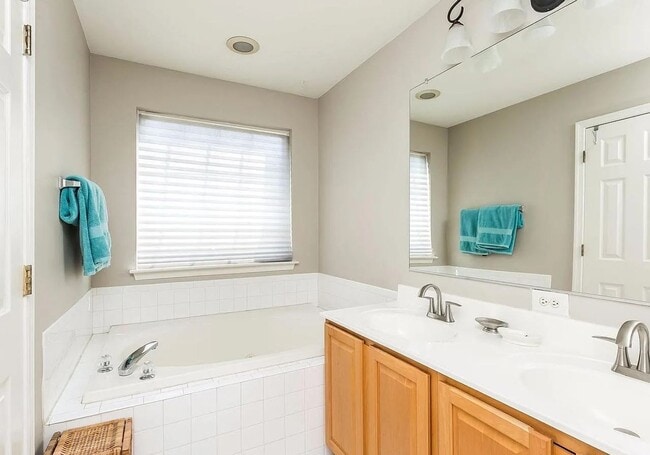 Building Photo - Coming Soon – 3BR/4BA End-Unit Townhome wi...