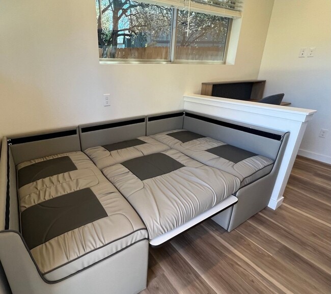 Building Photo - Enjoy minimalist living with maximum comfo...