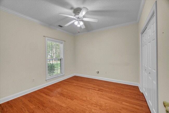 Building Photo - Stunning all-brick home on a large wooded lot