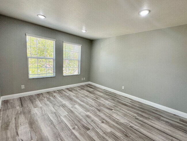 Building Photo - Corner Unit Two Story Townhome in the Beau...