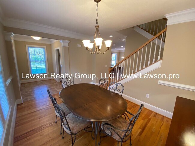 Building Photo - Colonial Green Row Home with Two Car Garage