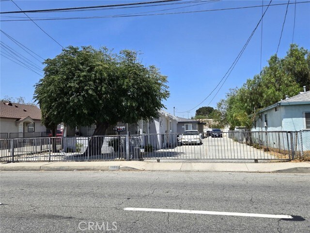 Building Photo - 16466 Arrow Blvd
