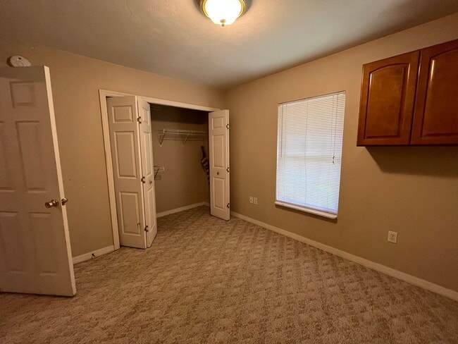 Building Photo - 3BR/2BA Home with 2 Car Garage, Fenced Yard & RV Hookups – Lake City, FL