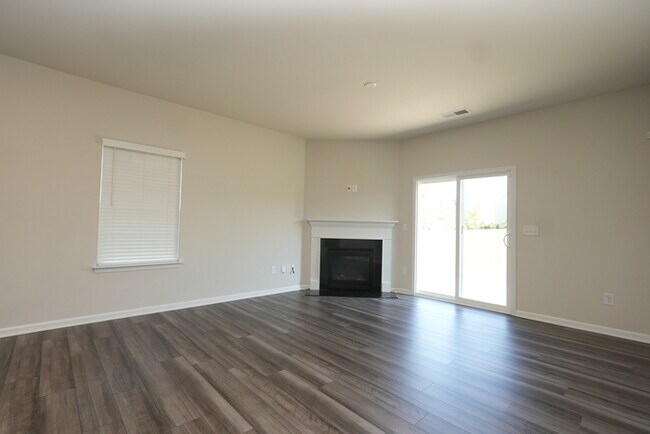 Building Photo - Spacious 4-Bedroom Home with Modern Comforts