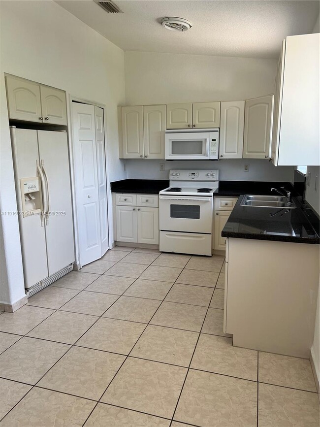 Building Photo - 7291 NW 174th Terrace