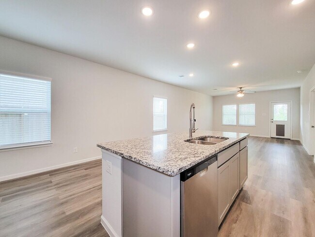 Building Photo - Welcome Home! Your never-lived-in sanctuary awaits your arrival. Have a large household? This 5-b...