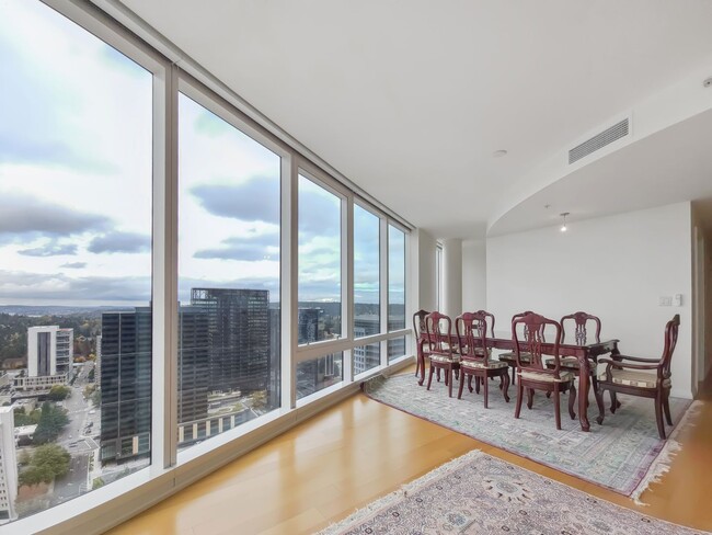 Building Photo - Elegant High-Rise Condo with Stunning Wate...