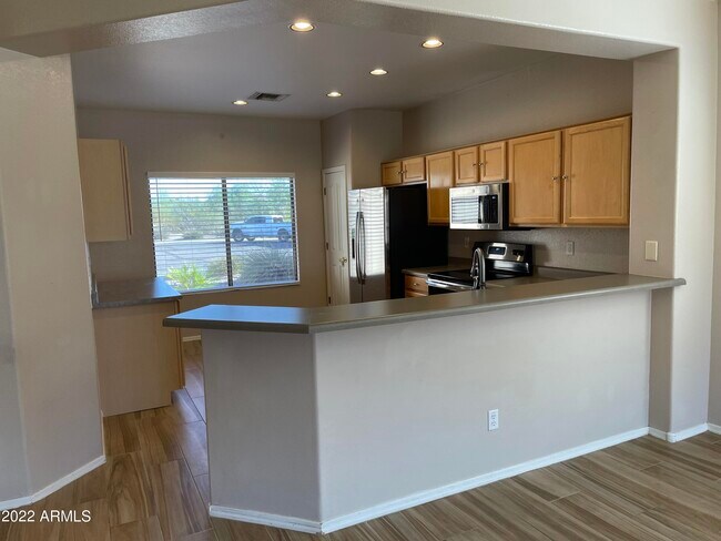 Building Photo - 6511 W Range Mule Dr