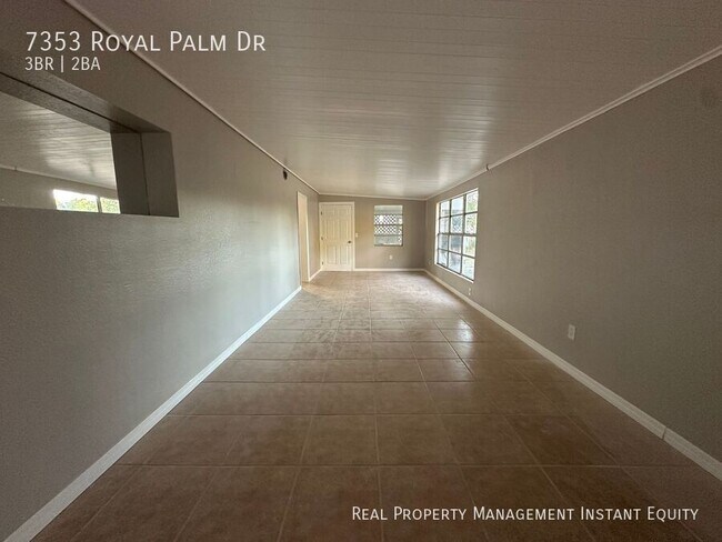 Building Photo - 7353 Royal Palm Dr