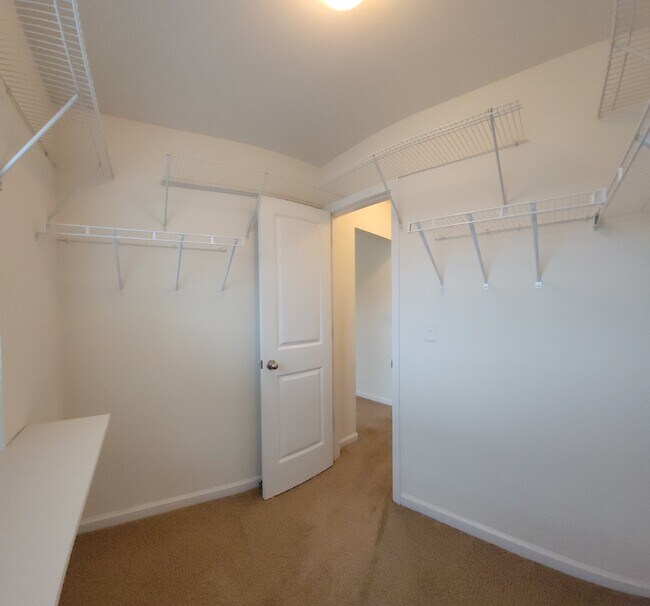 Building Photo - "Modern 3-Bedroom Multiplex with 3 Full Ba...