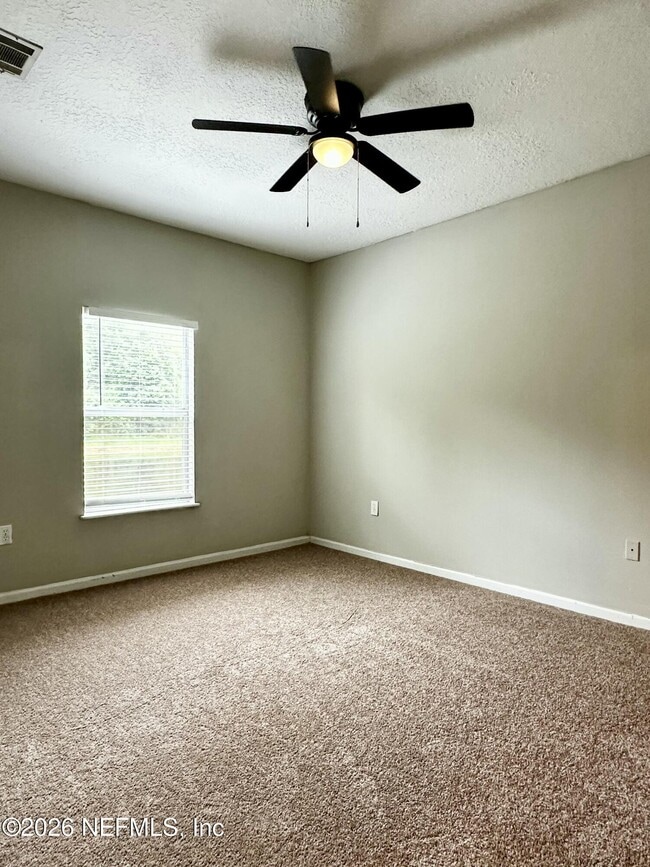 Building Photo - 6985 Ortega Woods Dr