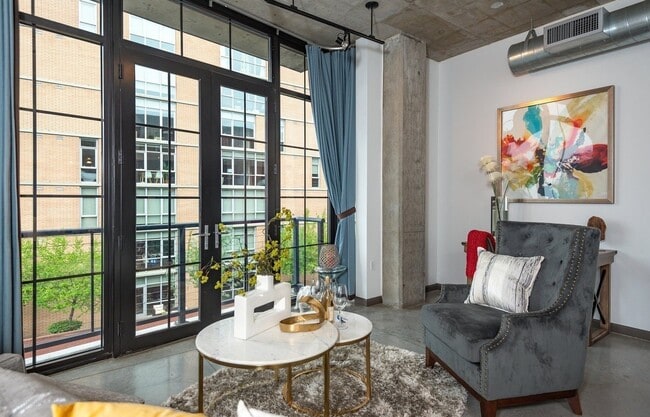 Building Photo - Rare Availability in the Streetcar Lofts, Parking, and Some Utilities Included
