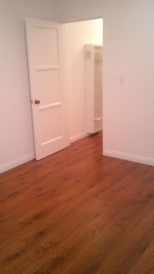 Bedroom 2 wood flooring - 512 N Lucia Ave