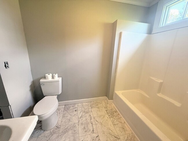 Building Photo - 1BR Apartment with Private Entrance in Downtown Lake Charles | Located Behind Historic Home