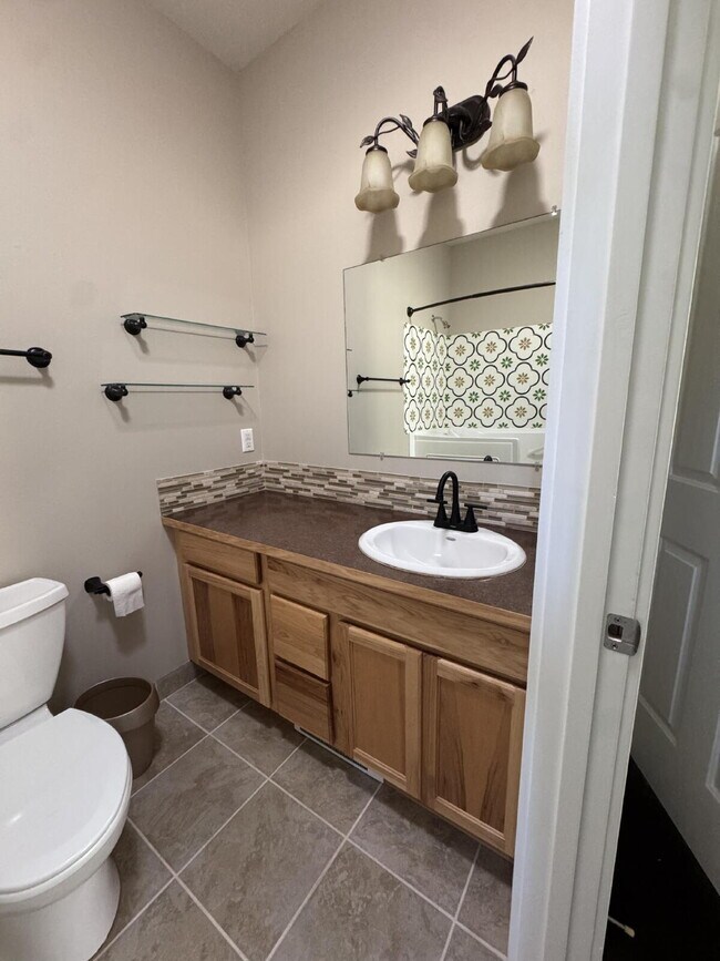 Building Photo - Single-family 3-bedroom home in a desirable neighborhood in town!