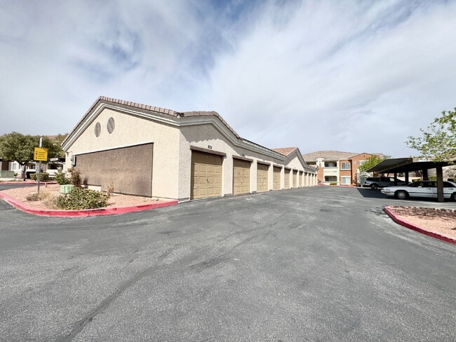 Building Photo - DOWNSTAIRS CONDO | GATED COMMUNITY | CENTENNIAL HILLS | UPDATED 3 BEDROOM