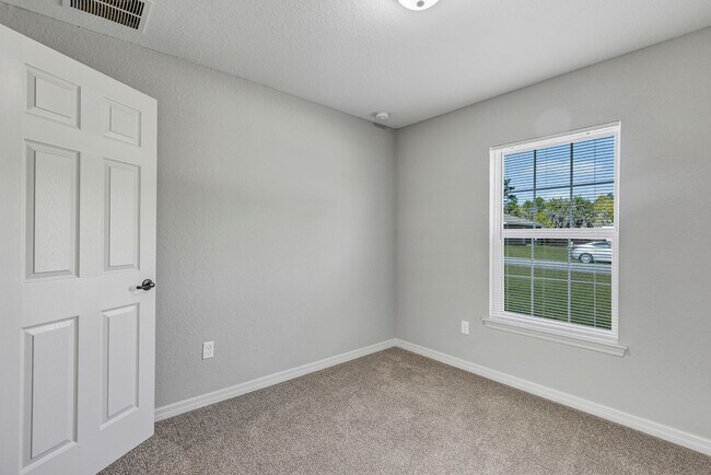 Building Photo - Freshly Painted 3BR Home with Spacious Yard, Modern Baths & No Deposit Option!