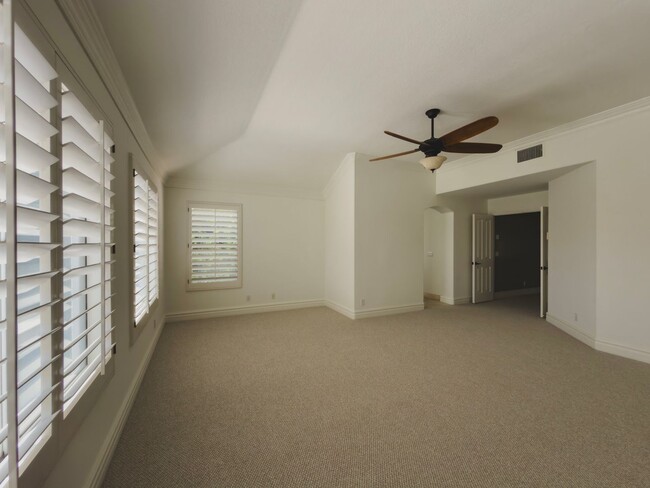 Building Photo - Elegant Mediterranean Living with Private Pergola Garden & Resort Amenities