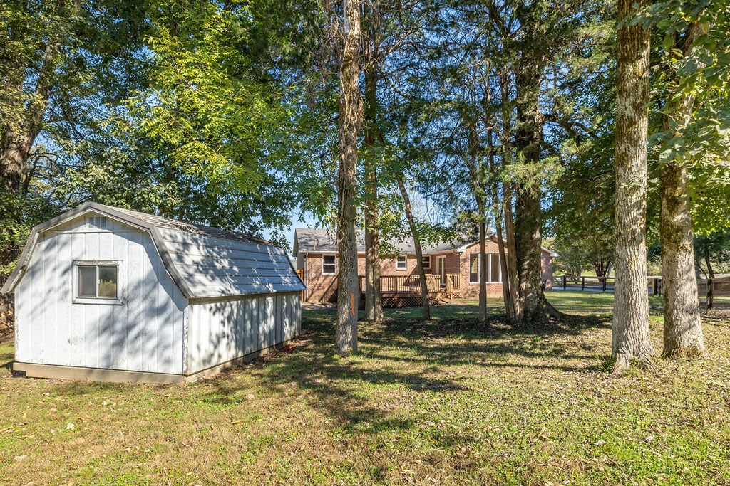 Dutch Barn for storage is in the fenced in part of the yard. - 8171 Horton Hwy